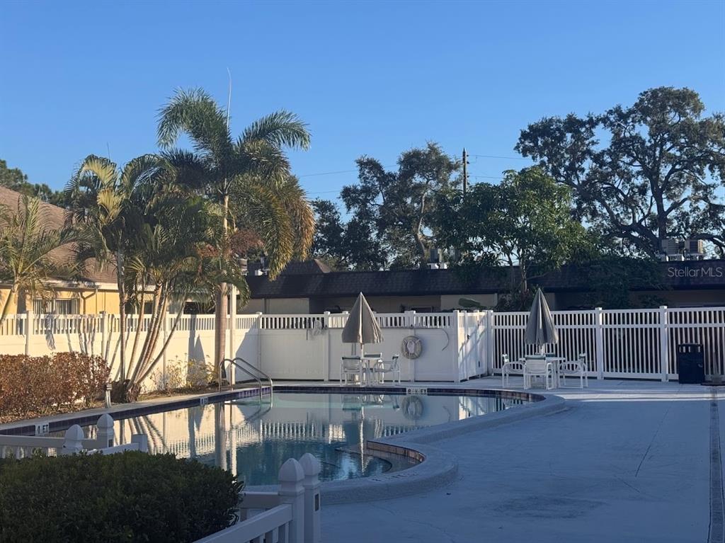 670 Green Valley Road, Unit F9 Palm Harbor, FL 34683 - Photo 3 of 22 a view of house with outdoor seating