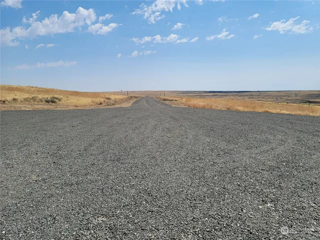 a view of an ocean beach and mountain