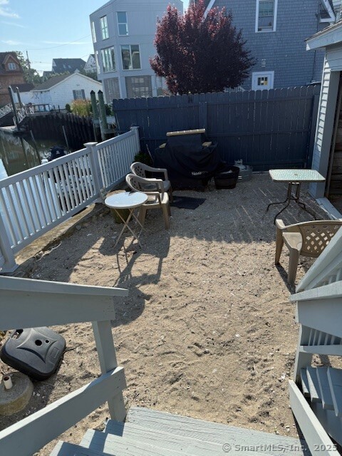 2144 Fairfield Beach Road Fairfield, CT 06824 - Photo 22 of 32 a view of a terrace with furniture