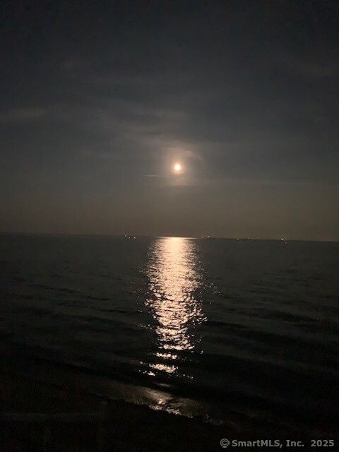 2144 Fairfield Beach Road Fairfield, CT 06824 - Photo 30 of 32 a view of a lake from a room