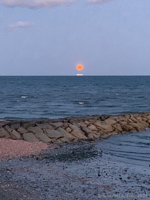 2144 Fairfield Beach Road Fairfield, CT 06824 - Photo 32 of 32 a view of a dry room with wooden floor
