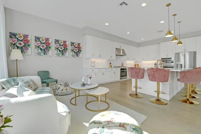 a view of a lake with a table and chairs