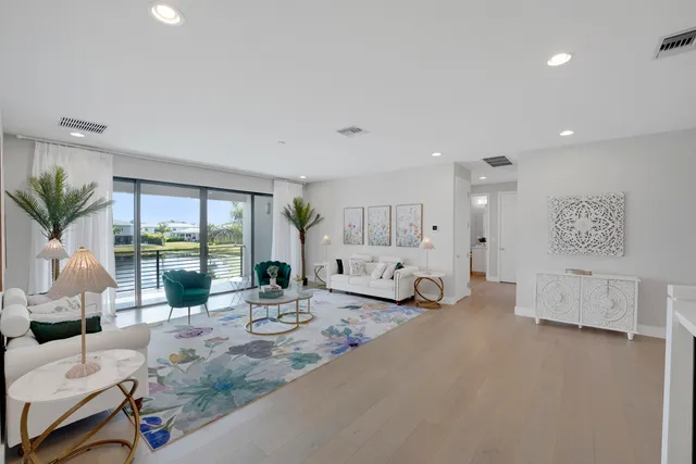 a view of swimming pool with a table and chair