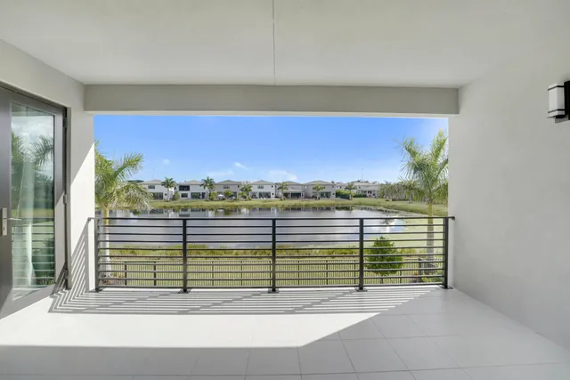 a view of a house with a yard and plants