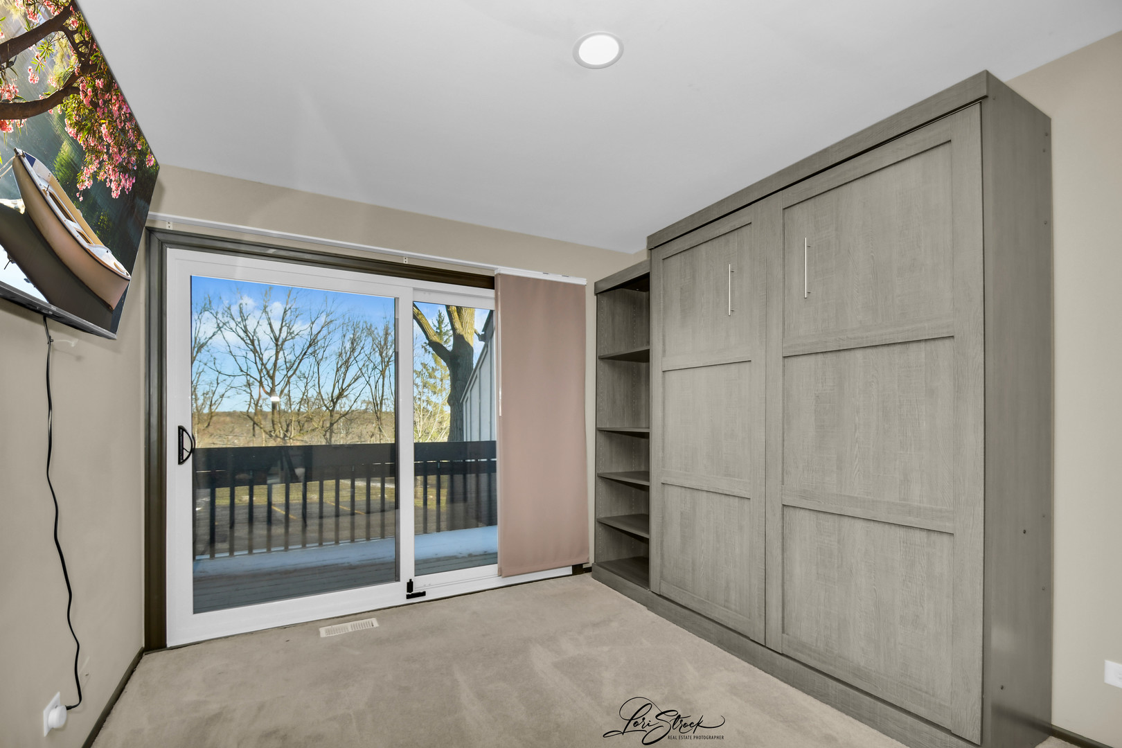 1052 Florimond Drive Elgin, IL 60123 - Photo 12 of 24 a view of an empty room with a window