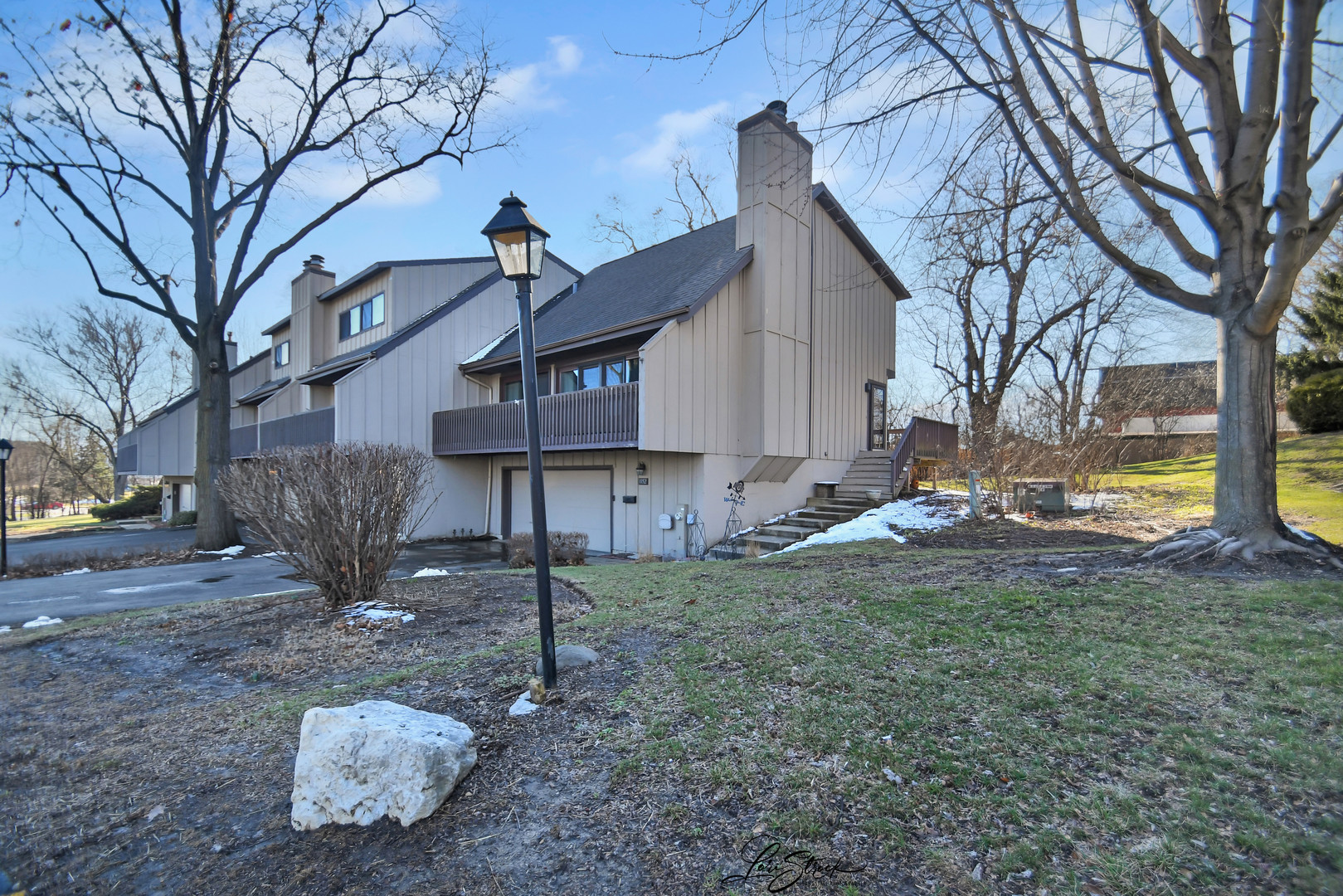 1052 Florimond Drive Elgin, IL 60123 - Photo 2 of 24 a view of a house with a yard