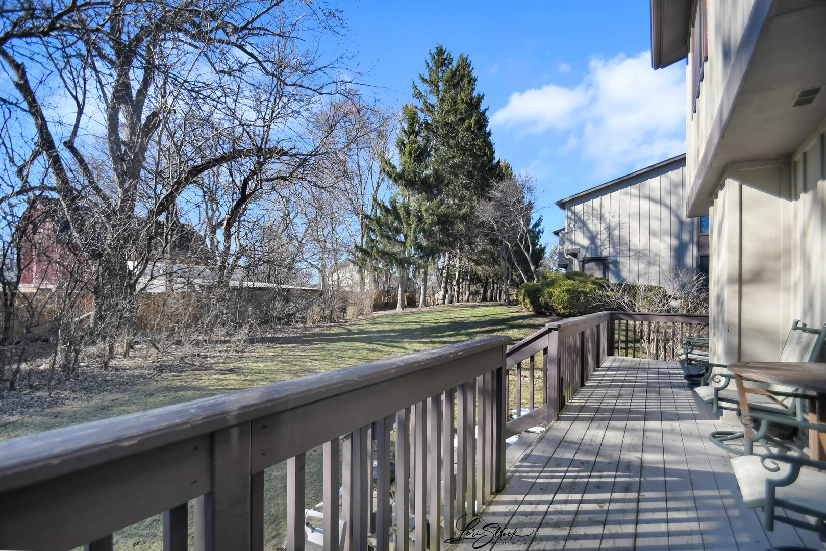 1052 Florimond Drive Elgin, IL 60123 - Photo 21 of 24 a view of a patio with wooden fence