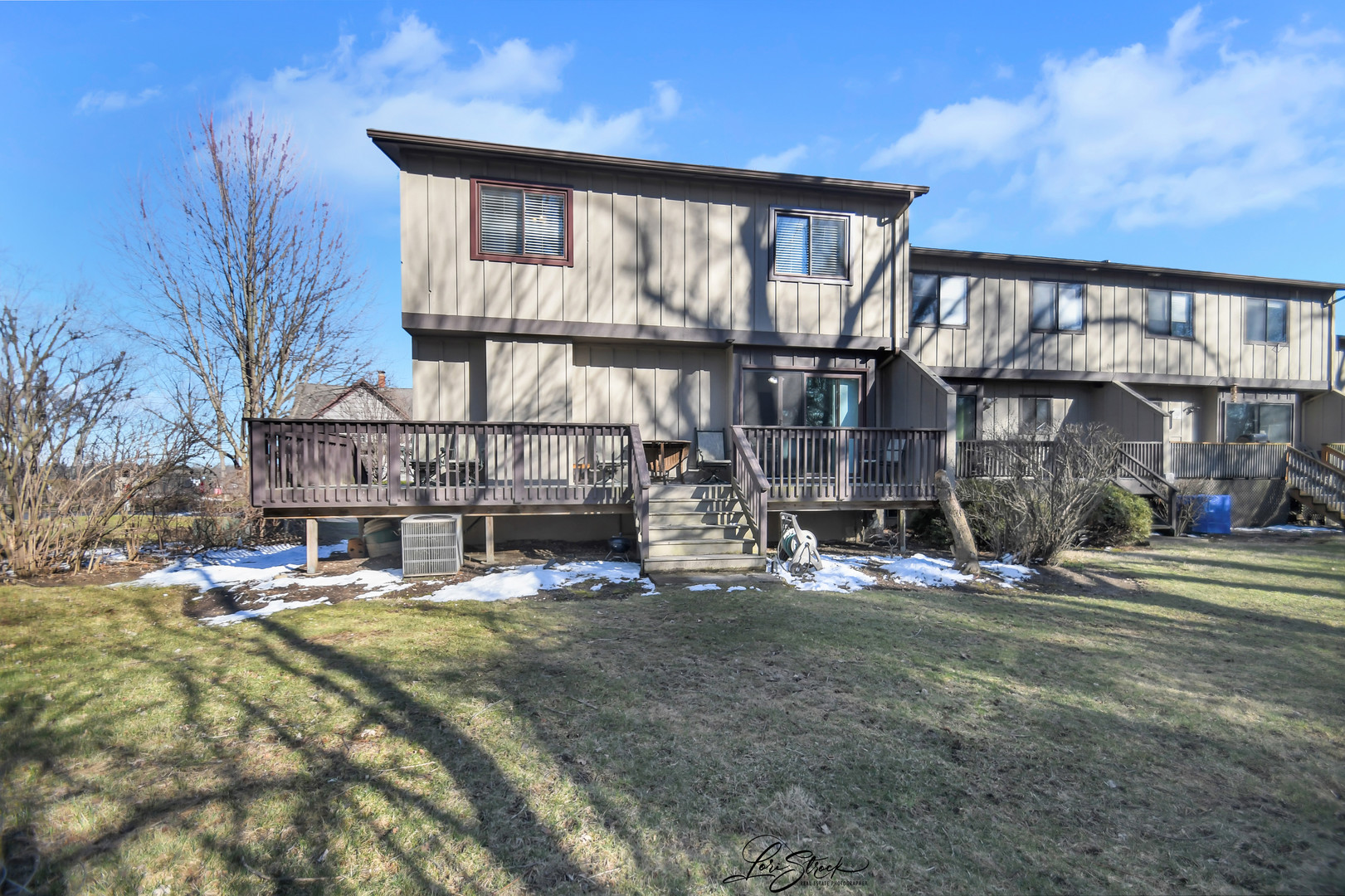 1052 Florimond Drive Elgin, IL 60123 - Photo 23 of 24 a view of a house with a yard and sitting area