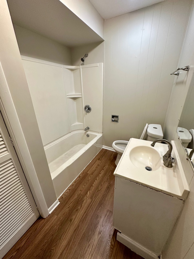3729 Grove Avenue Berwyn, IL 60402 - Photo 11 of 20 a bathroom with a sink a toilet and shower