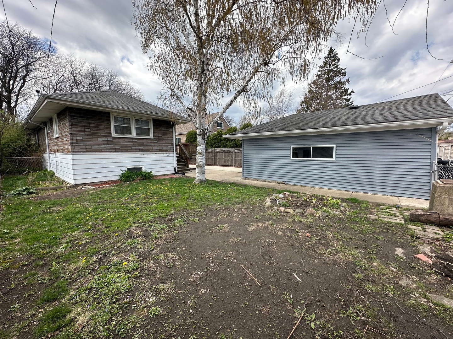 3729 Grove Avenue Berwyn, IL 60402 - Photo 19 of 20 a front view of a house with garden