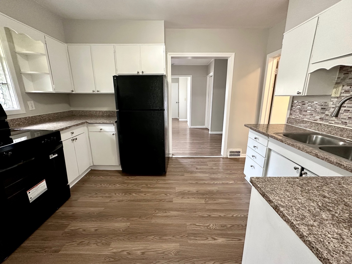 3729 Grove Avenue Berwyn, IL 60402 - Photo 5 of 20 a kitchen with a sink stove and refrigerator