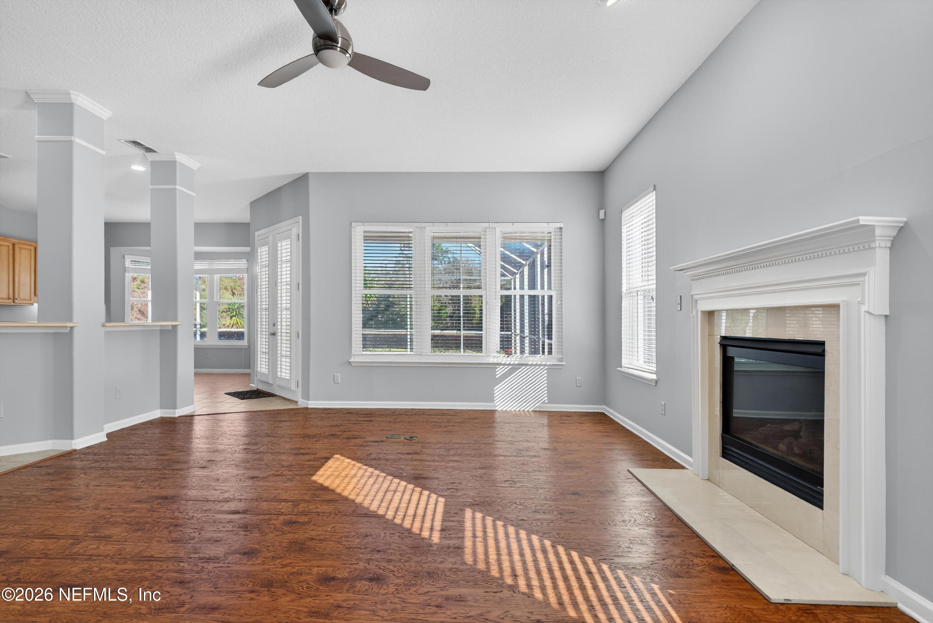 237 Strawberry Lane St. Johns, FL 32259 - Photo 12 of 28 a view of an empty room with window and fire place