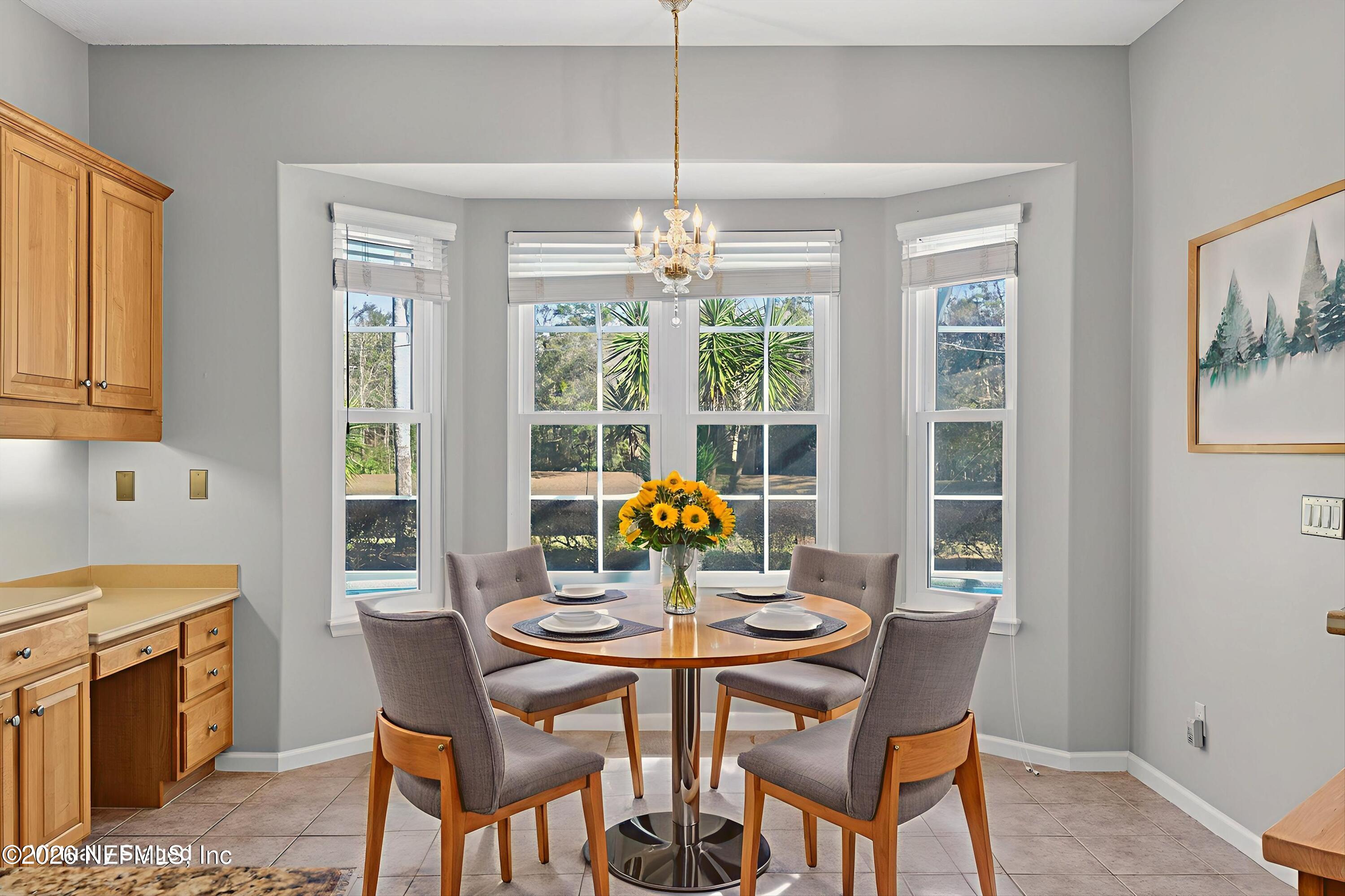 237 Strawberry Lane St. Johns, FL 32259 - Photo 14 of 28 a view of a dining room with furniture window and outside view