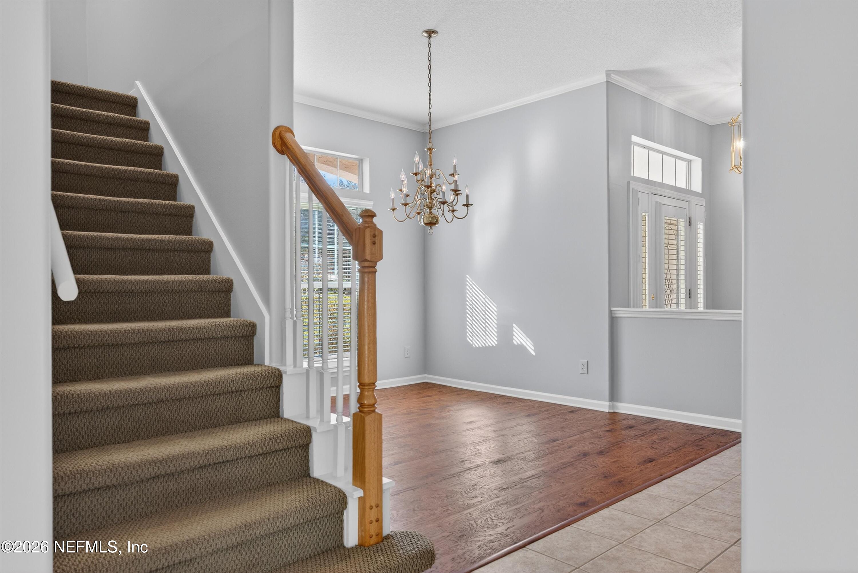 237 Strawberry Lane St. Johns, FL 32259 - Photo 16 of 28 a view of entryway and hall with wooden floor