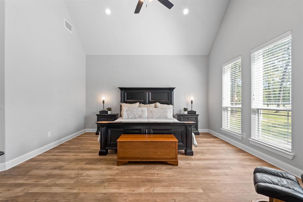 6707 Anchor Quinlan, TX 75474 - Photo 20 of 40 Huge primary bedroom with tons of natural lighting.