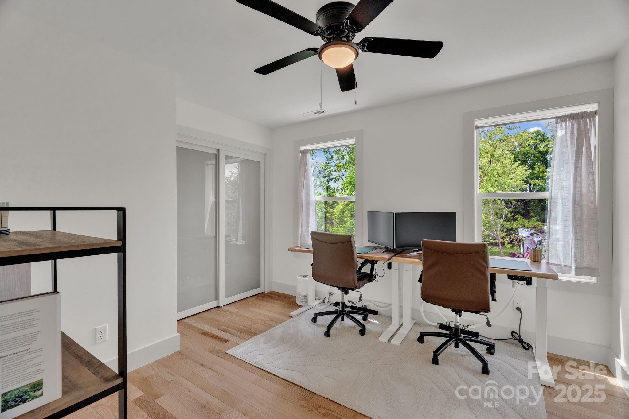 30 Spaulding Road Candler, NC 28715 - Photo 15 of 30 a view of workspace with wooden floor windows
