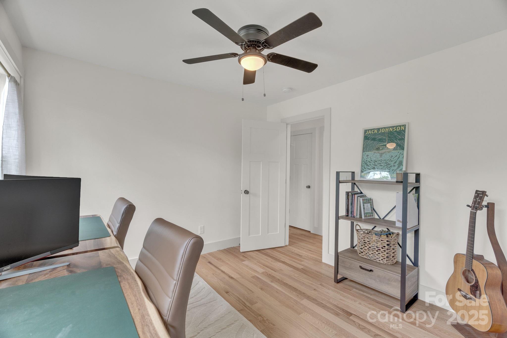 30 Spaulding Road Candler, NC 28715 - Photo 16 of 30 a workspace with furniture a ceiling fan
