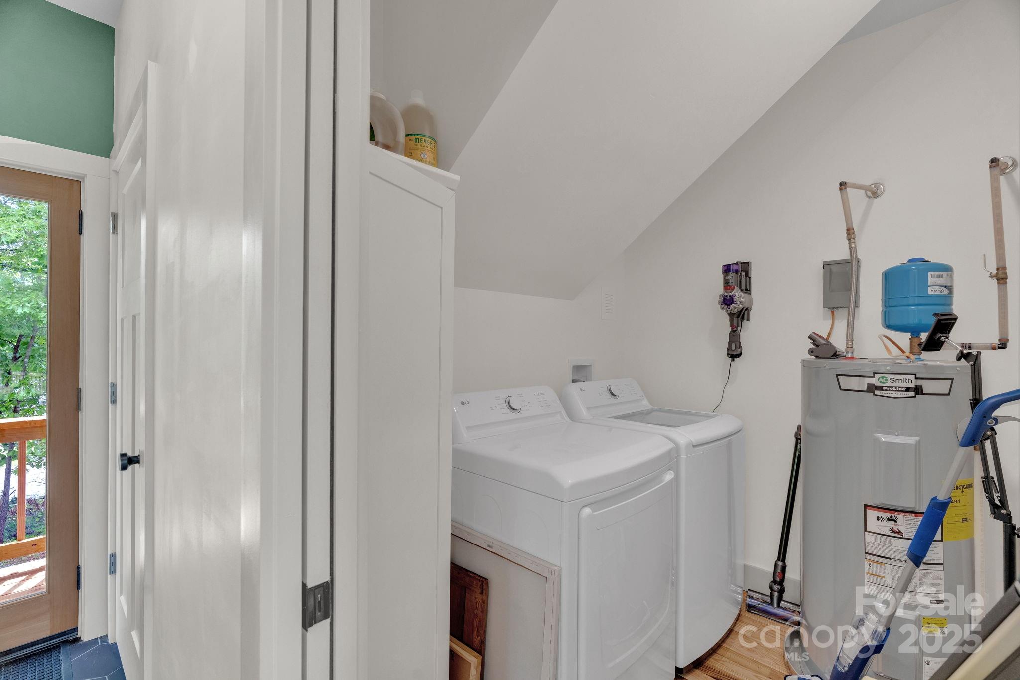 30 Spaulding Road Candler, NC 28715 - Photo 23 of 30 a bathroom with a double vanity sink