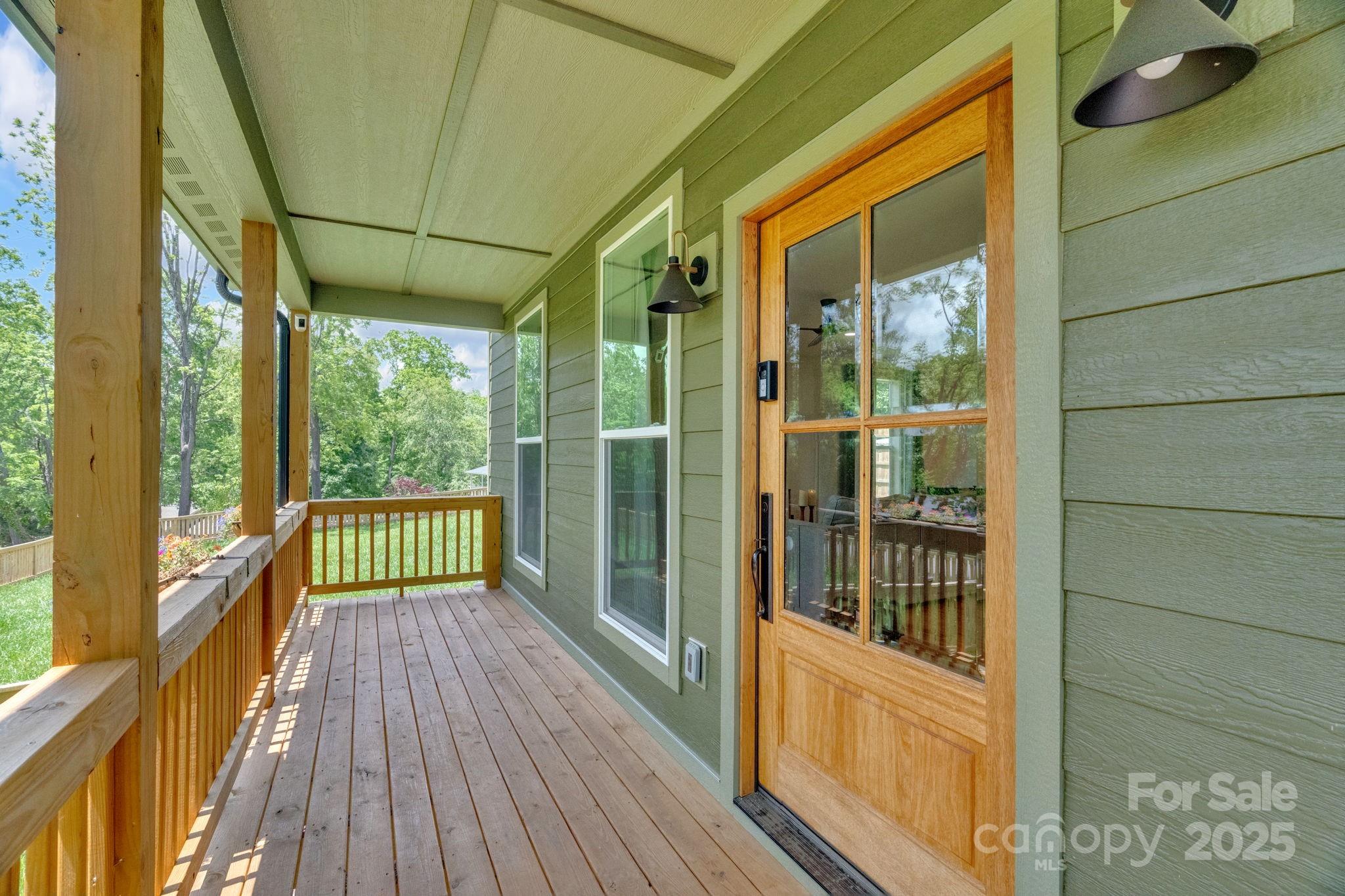 30 Spaulding Road Candler, NC 28715 - Photo 25 of 30 a view of a balcony with wooden floor