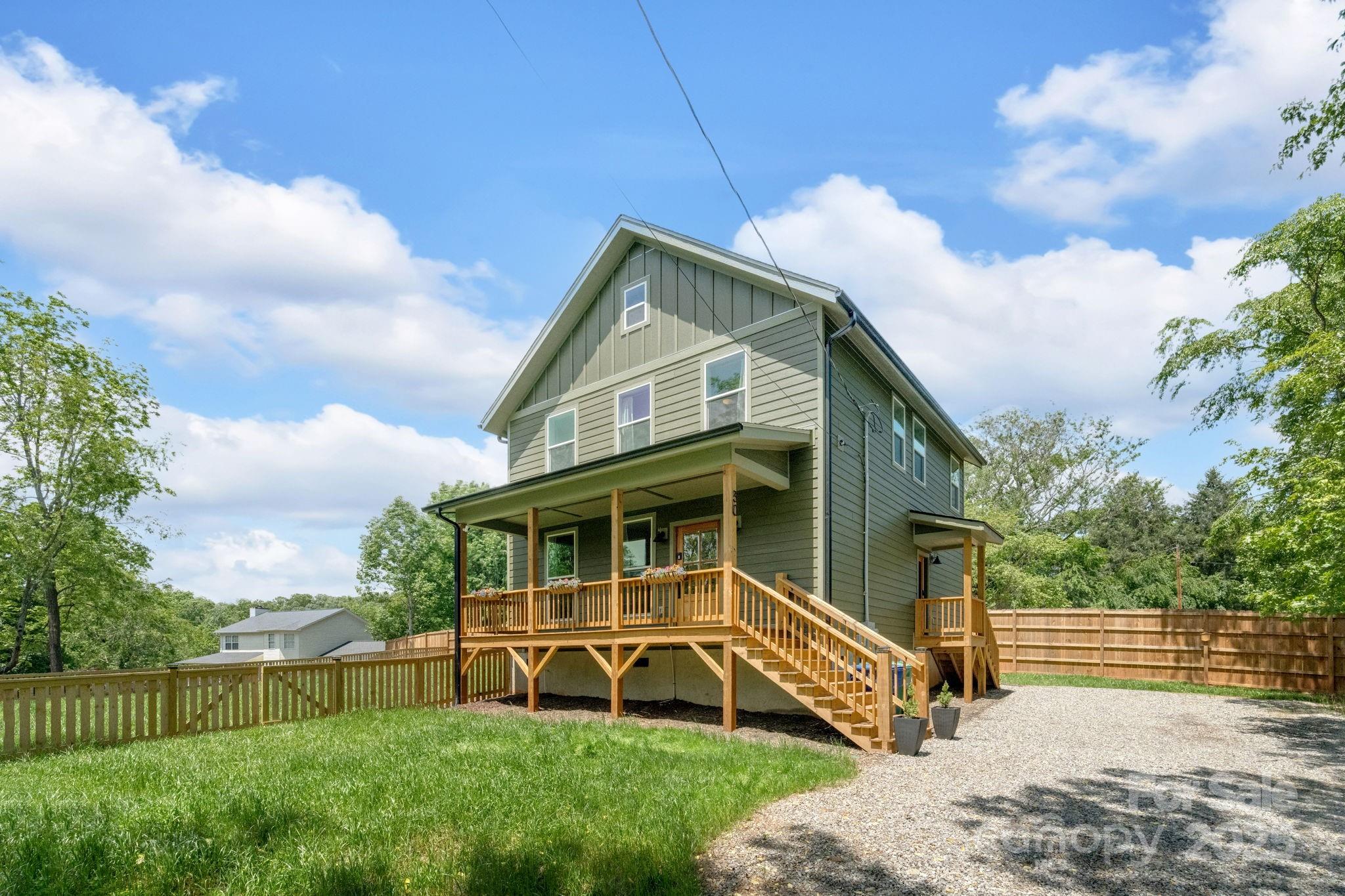 30 Spaulding Road Candler, NC 28715 - Photo 28 of 30 a view of a house with a yard