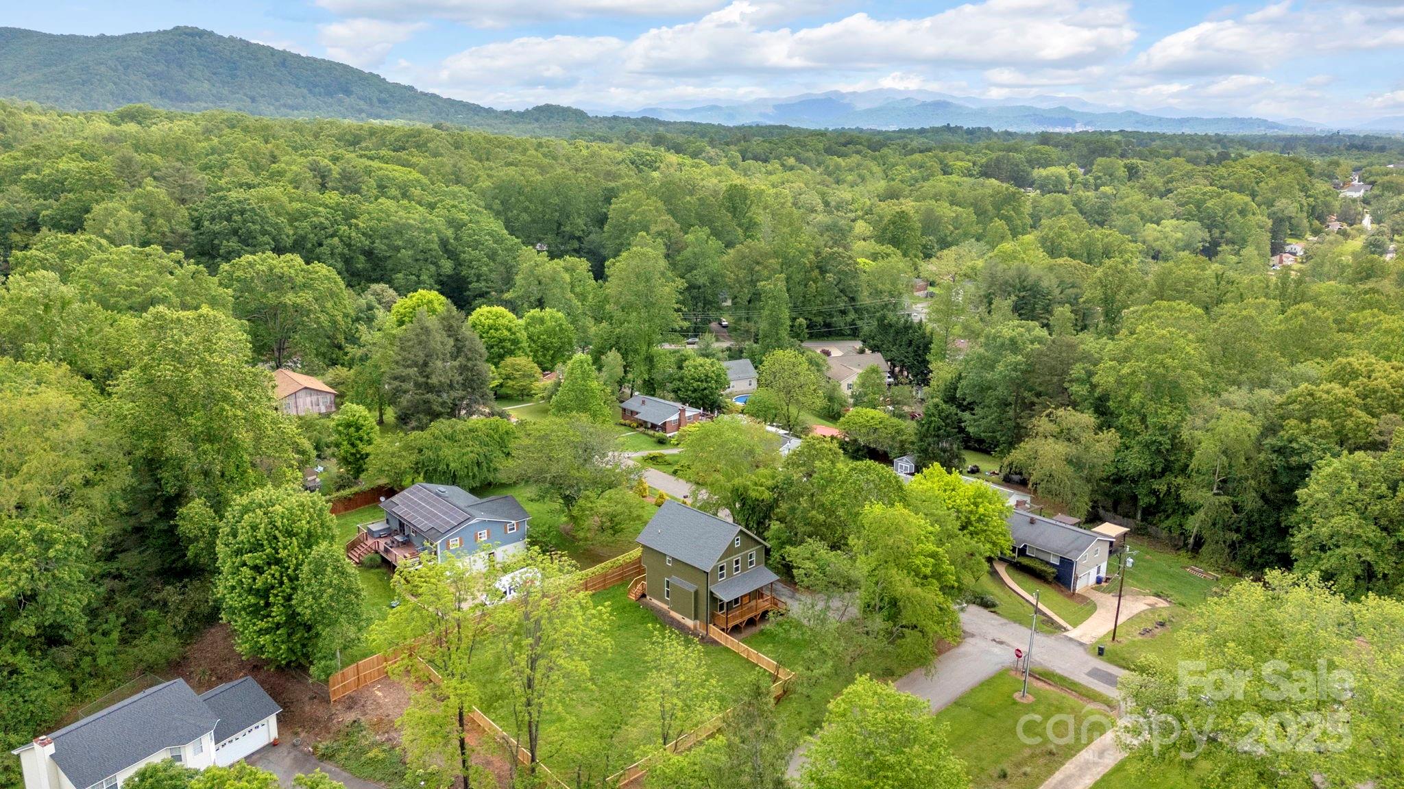 30 Spaulding Road Candler, NC 28715 - Photo 3 of 30 an aerial view of residential houses with outdoor space and trees