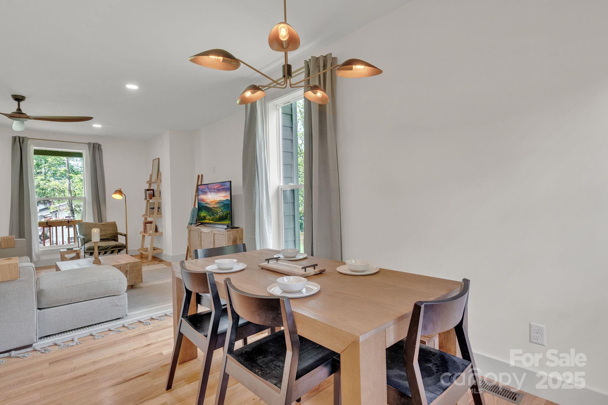 30 Spaulding Road Candler, NC 28715 - Photo 8 of 30 a view of a dining room with furniture and wooden floor