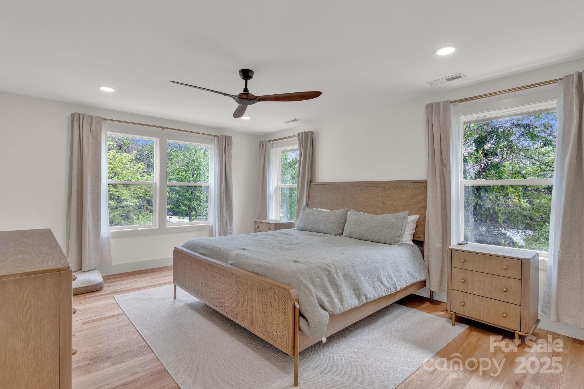 30 Spaulding Road Candler, NC 28715 - Photo 10 of 30 a bedroom with a large bed and a large window
