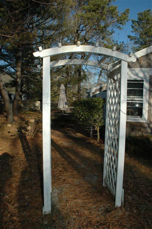 100 Blanid Road Osterville, MA 02655 - Photo 3 of 12 a view of a porch