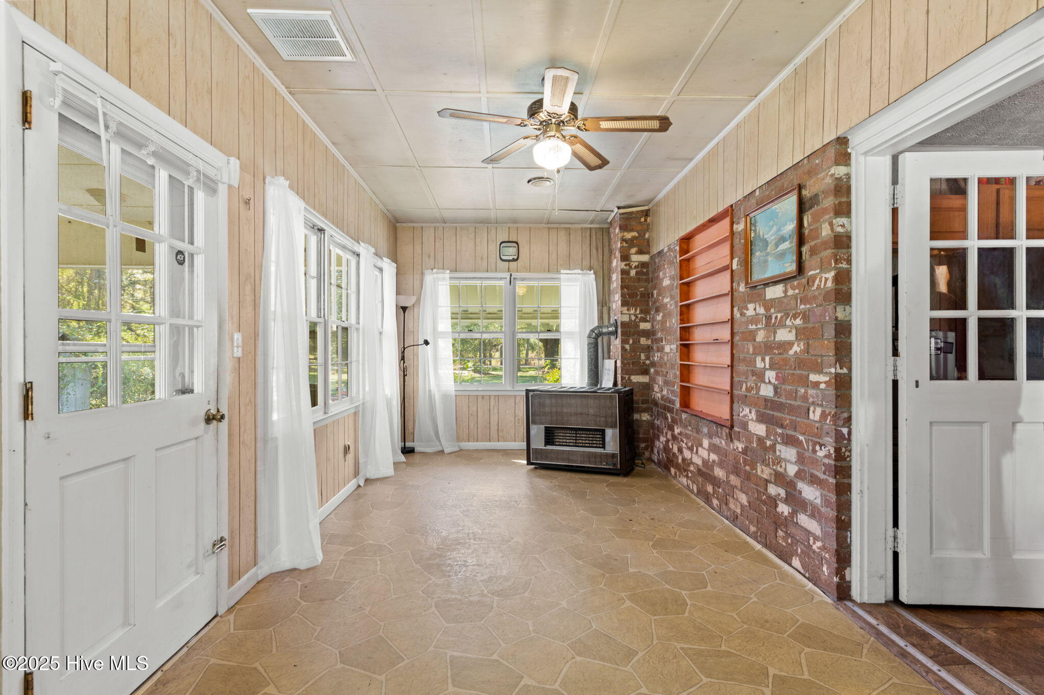 6882 Parker Road Northwest Ash, NC 28420 - Photo 21 of 31 Side room off kitchen and living room