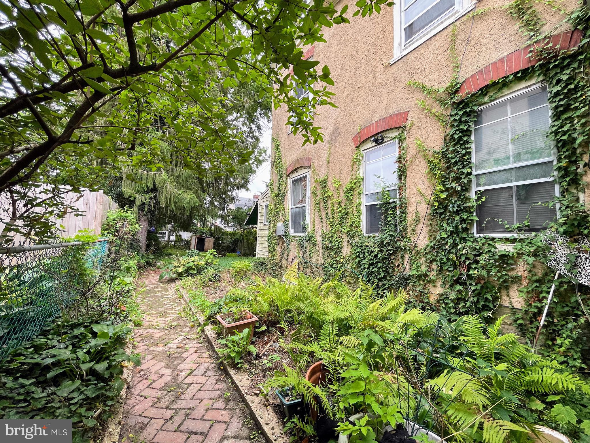 24 Westview Street Philadelphia, PA 19119 - Photo 10 of 13 a view of a pathway with a house