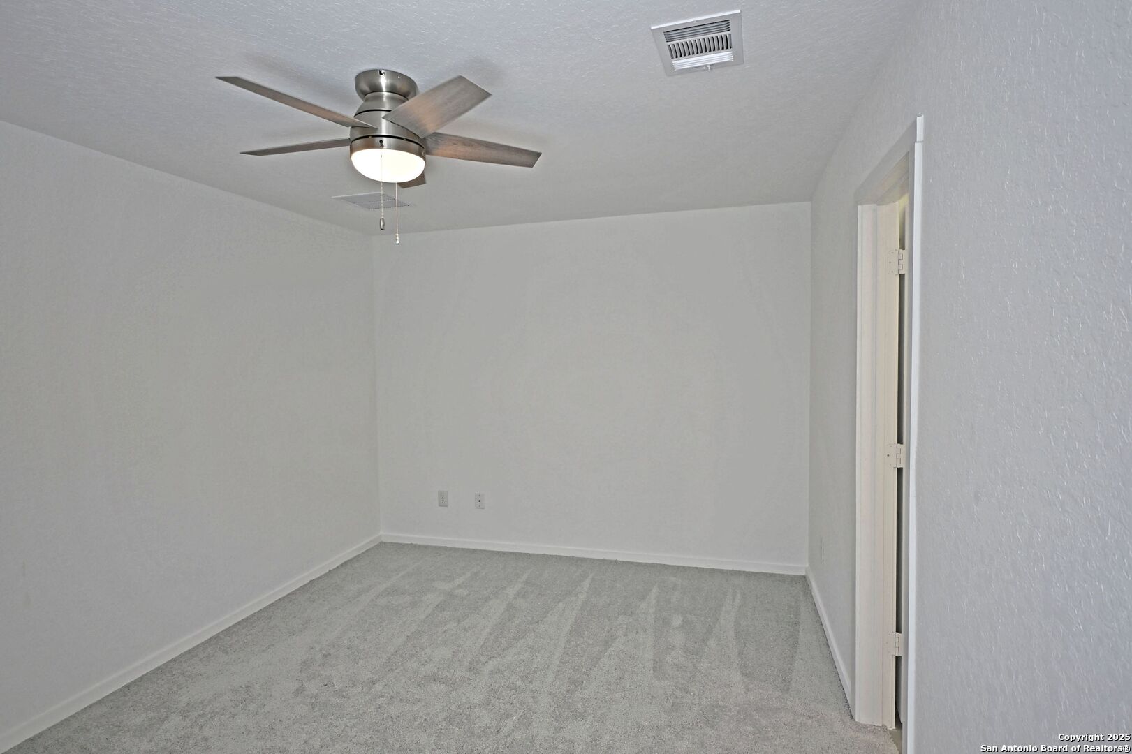 5014 Winecup Cove Converse, TX 78109 - Photo 15 of 25 an empty room