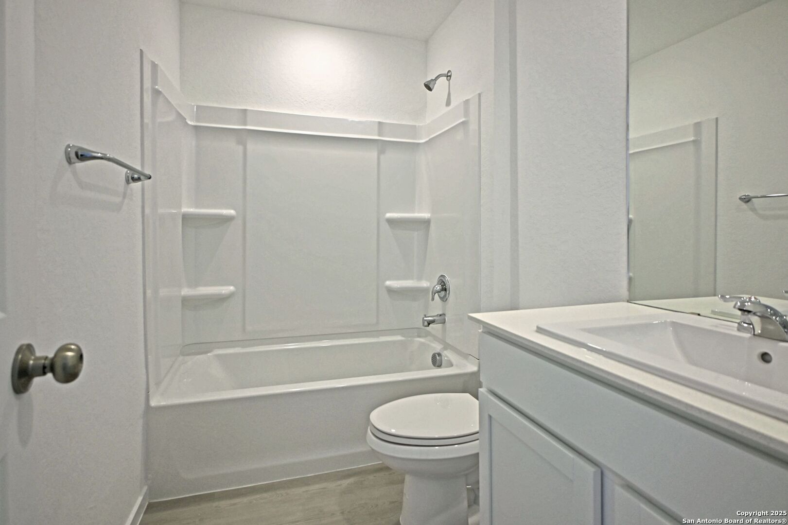 5014 Winecup Cove Converse, TX 78109 - Photo 19 of 25 a bathroom with a sink a toilet and shower