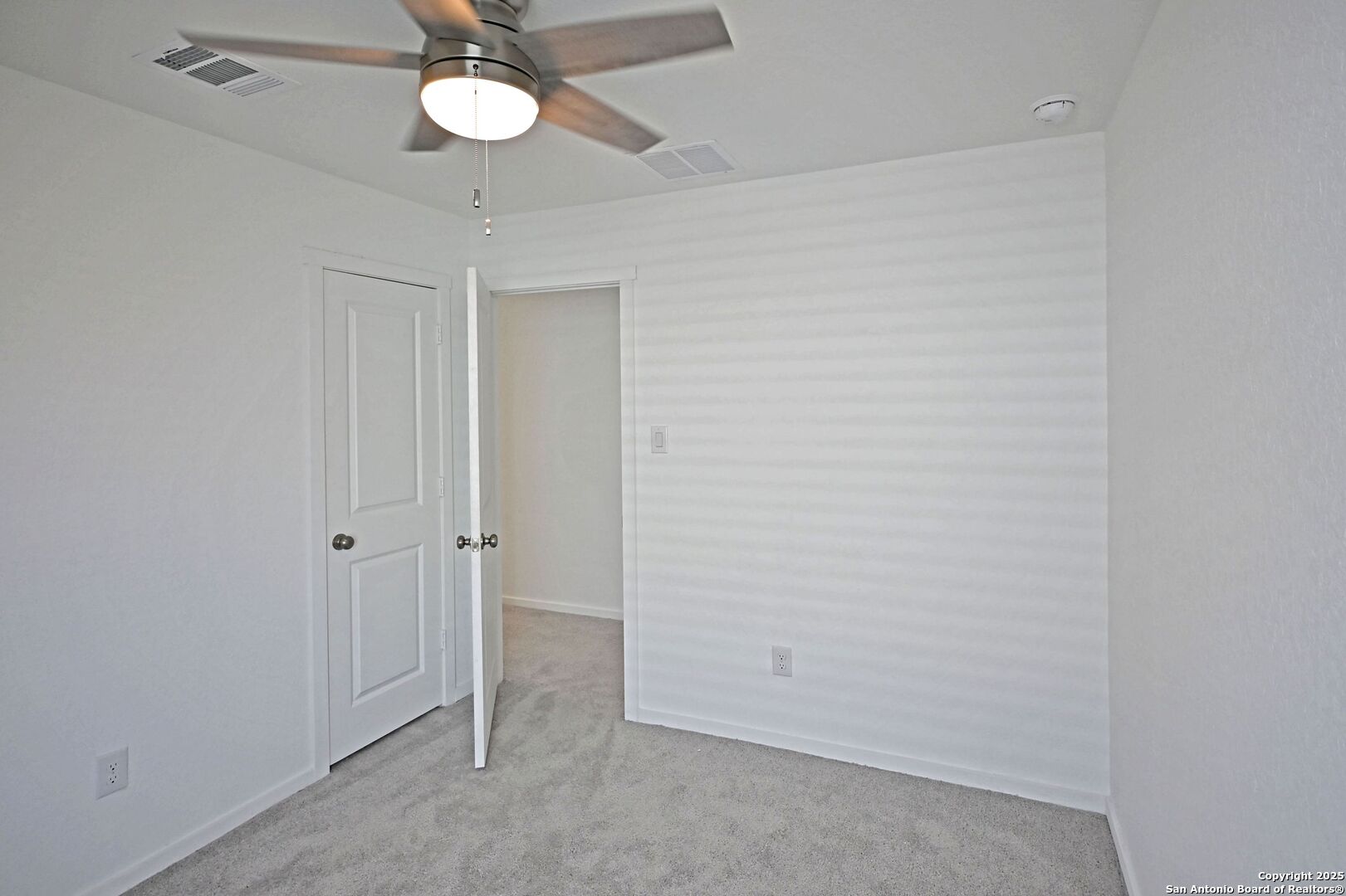 5014 Winecup Cove Converse, TX 78109 - Photo 22 of 25 wooden floor in an empty room