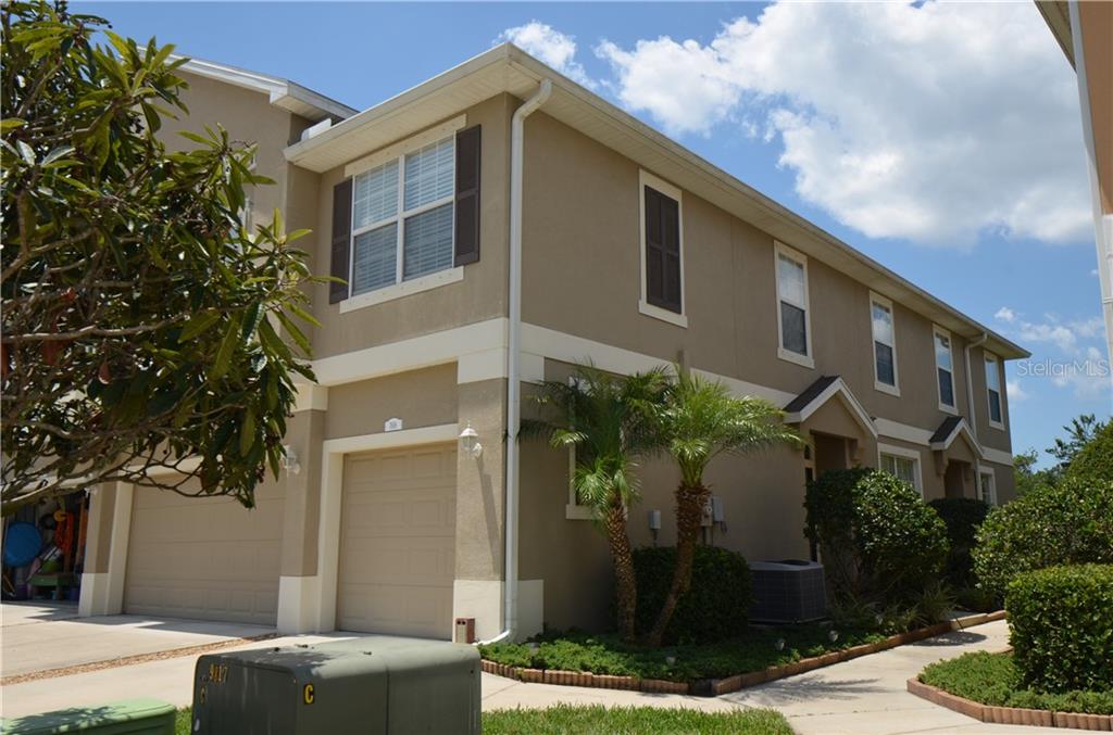 7616 Red Mill Circle New Port Richey, FL 34653 - Photo 1 of 1 Front and Side Entrance