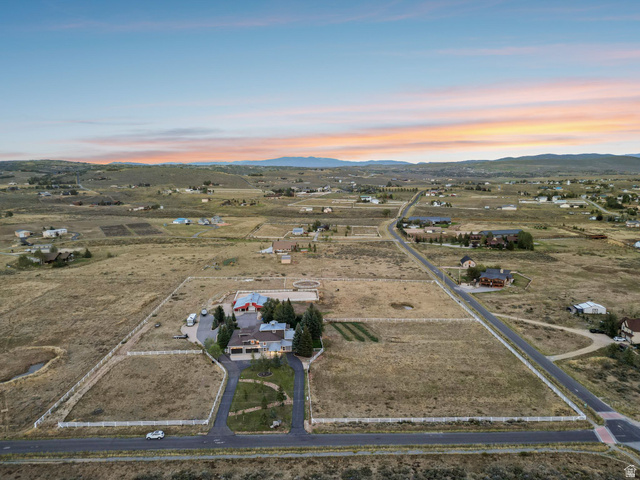 8650 Redden Road Park City, UT 84098 - Photo 60 of 71 Expansive property featuring a paved driveway, a large main residence, and additional structures
