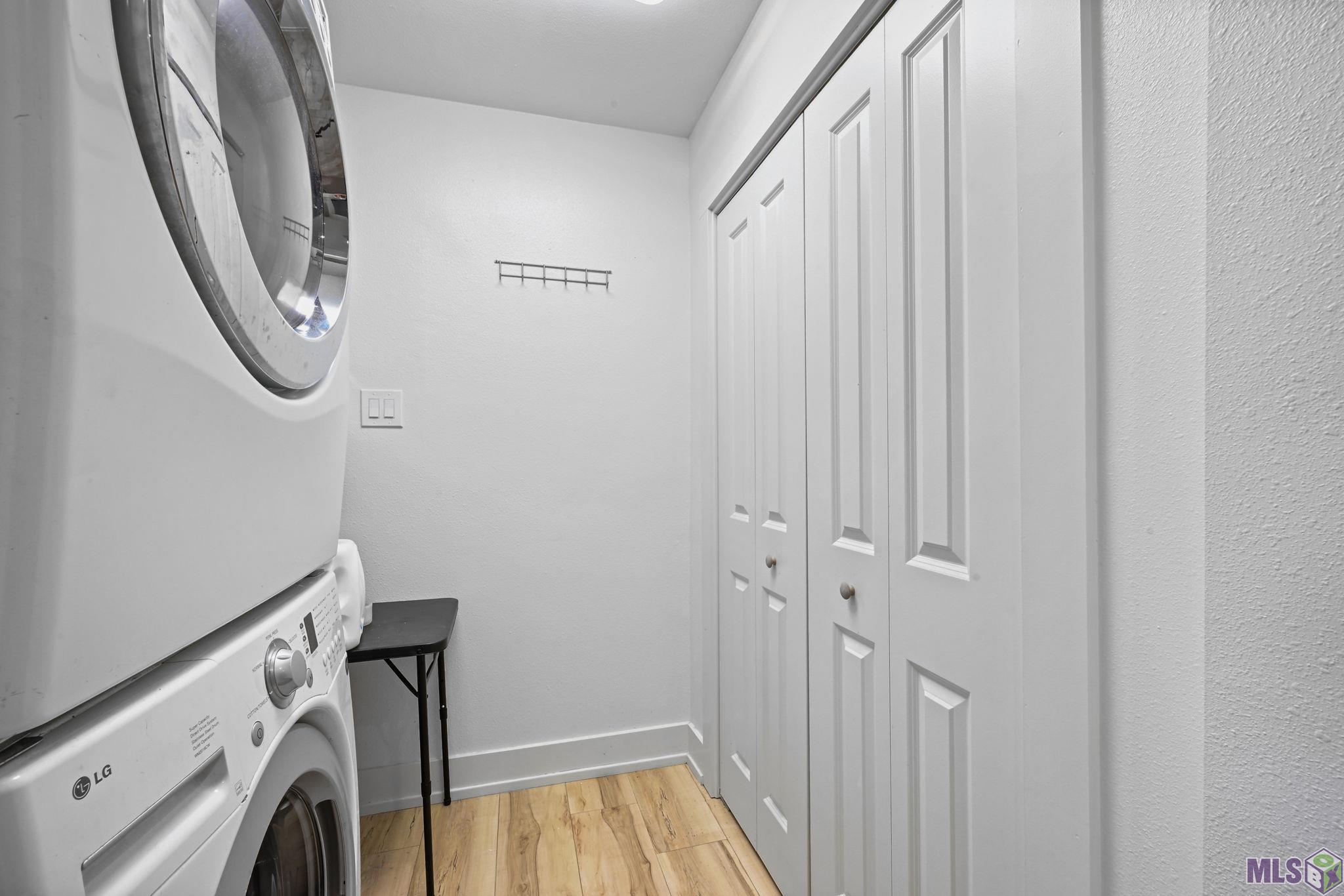9979 Hackberry Drive Baton Rouge, LA 70809 - Photo 22 of 27 Laundry with pantry