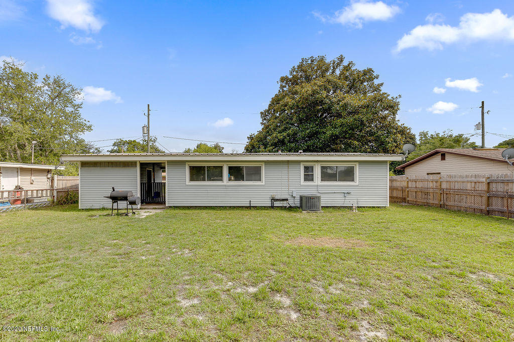 10453 Agave Road Jacksonville, FL 32246 - Photo 20 of 23 a house that has a big yard
