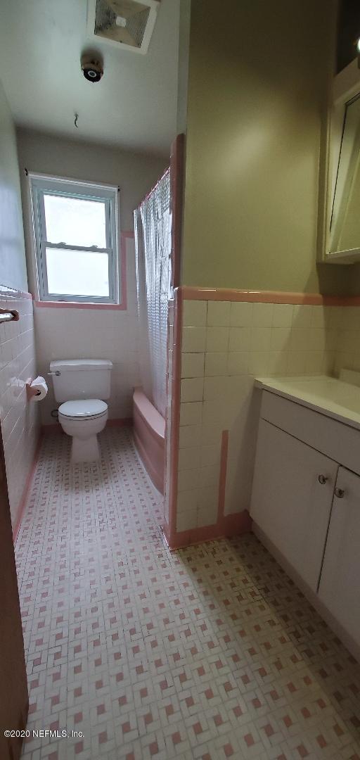10453 Agave Road Jacksonville, FL 32246 - Photo 21 of 23 a bathroom with a sink and a toilet