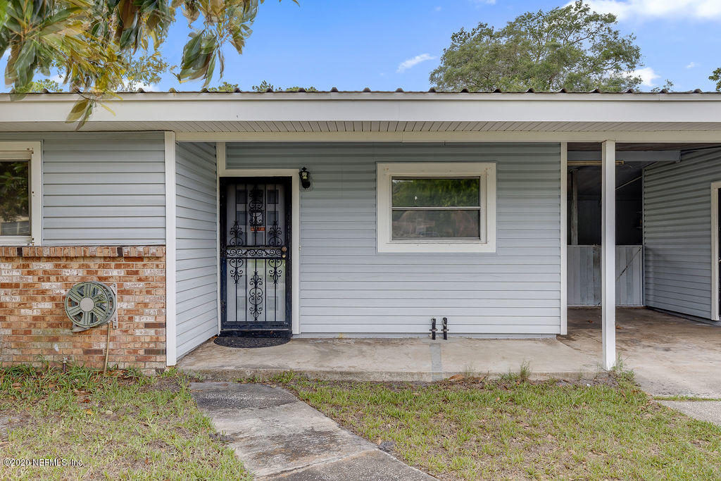 10453 Agave Road Jacksonville, FL 32246 - Photo 3 of 23 a front view of a house