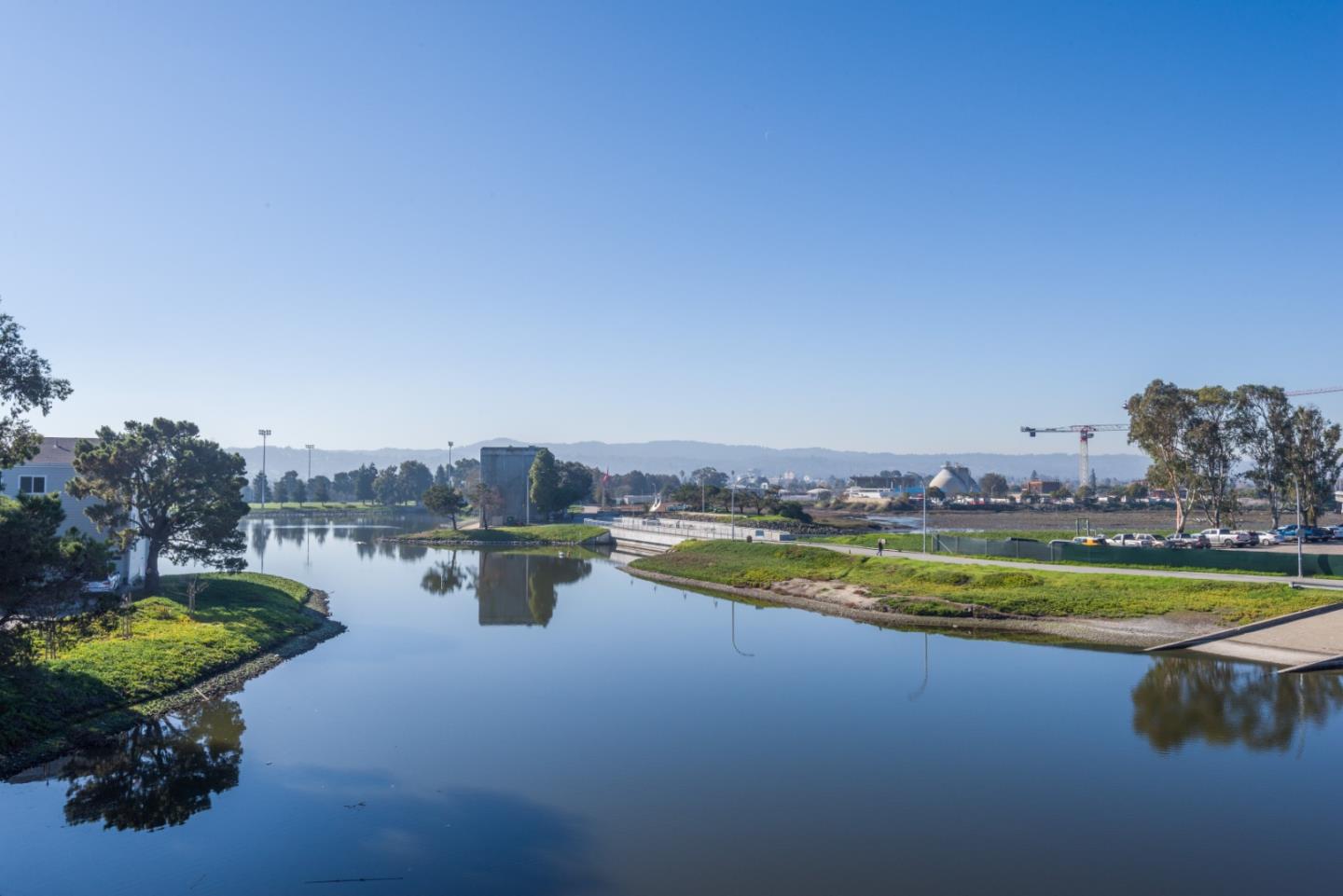 425 Anchor Road, Unit 317 San Mateo, CA 94404 - Photo 2 of 35 a view of a swimming pool with an outdoor seating and a yard