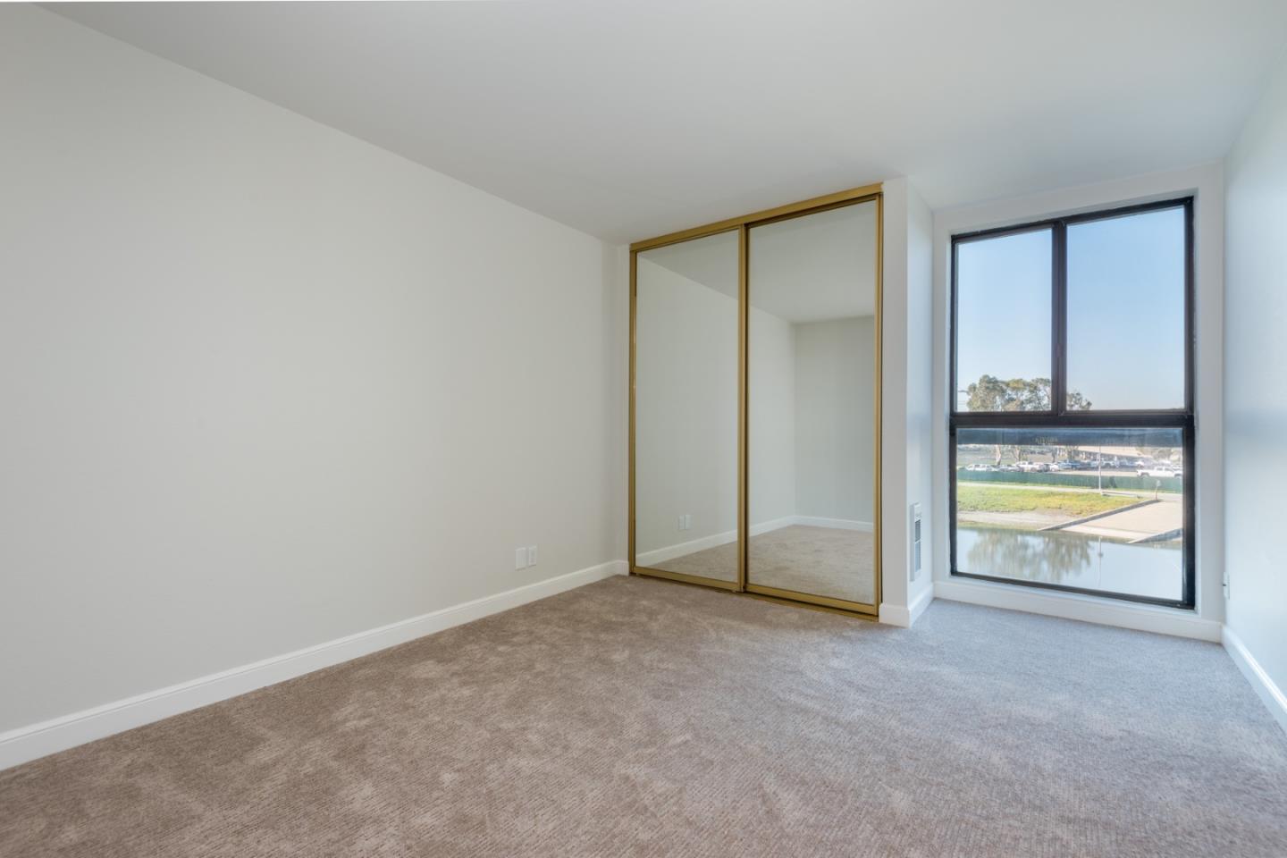 425 Anchor Road, Unit 317 San Mateo, CA 94404 - Photo 17 of 35 an empty room with an empty space and sink