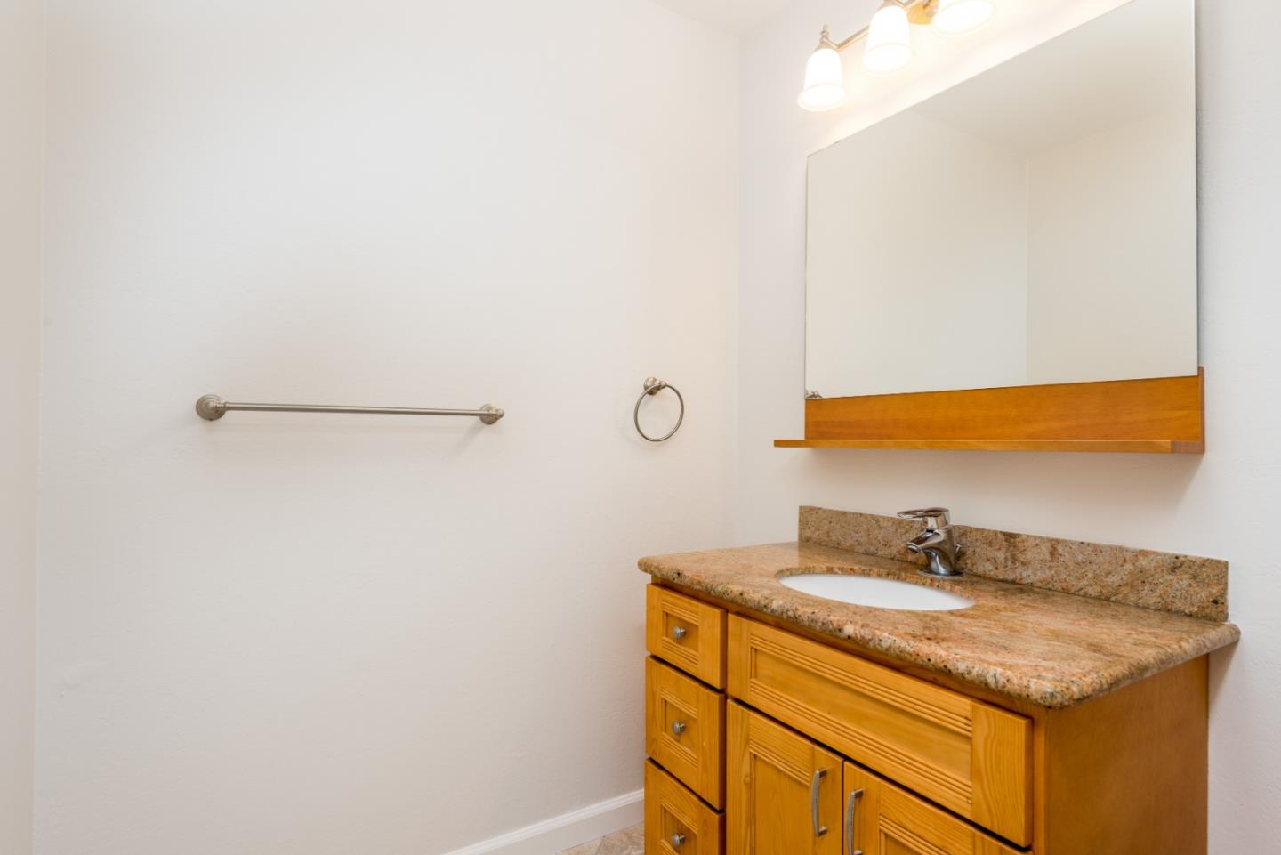 425 Anchor Road, Unit 317 San Mateo, CA 94404 - Photo 18 of 35 a bathroom with a sink and vanity