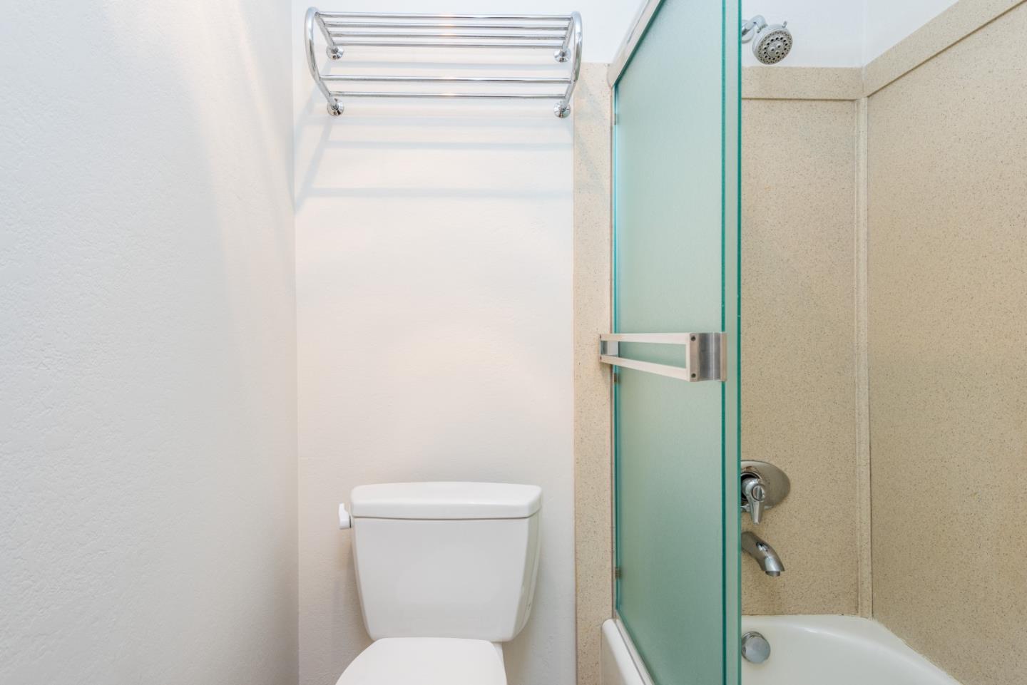 425 Anchor Road, Unit 317 San Mateo, CA 94404 - Photo 19 of 35 a bathroom with a toilet and a shower