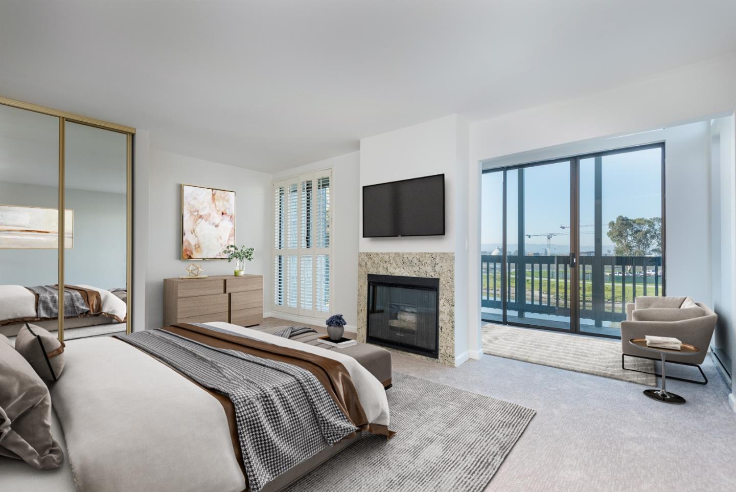 425 Anchor Road, Unit 317 San Mateo, CA 94404 - Photo 20 of 35 a bedroom with a bed and a television