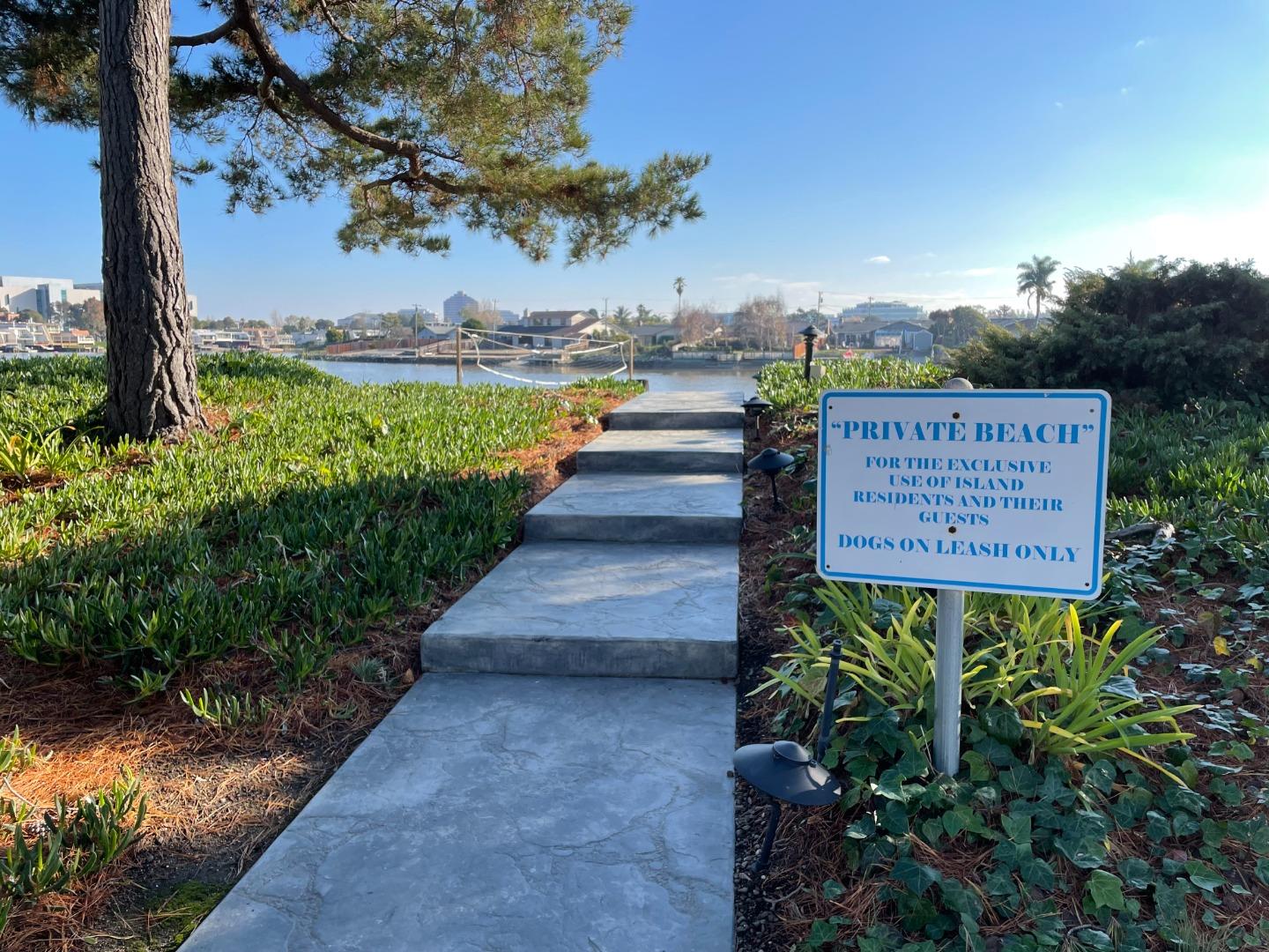 425 Anchor Road, Unit 317 San Mateo, CA 94404 - Photo 28 of 35 a sign board with a house in the background