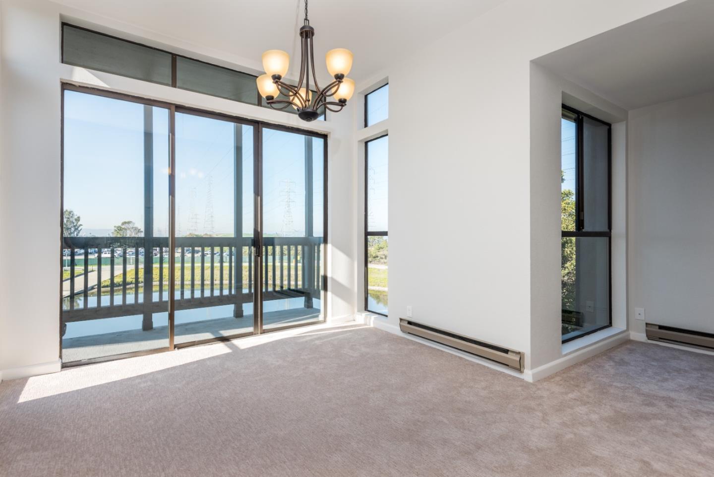 425 Anchor Road, Unit 317 San Mateo, CA 94404 - Photo 10 of 35 a view of a balcony with a ceiling fan