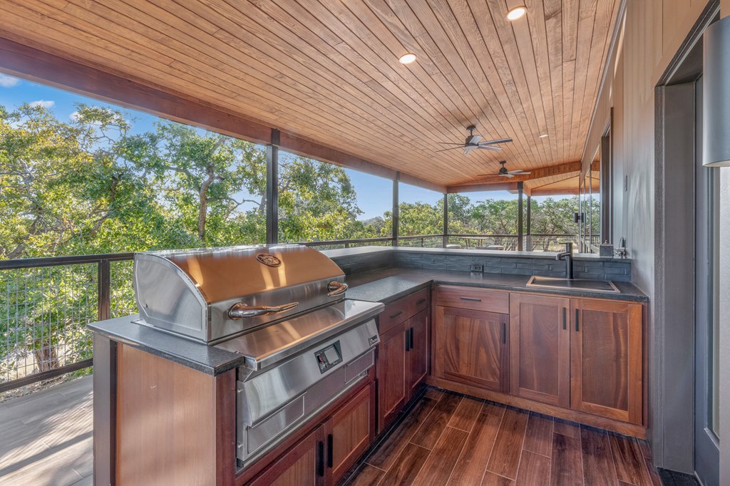 199 Hermosa Road Southwest Hunt, TX 78024 - Photo 24 of 59 a open kitchen with wooden floor