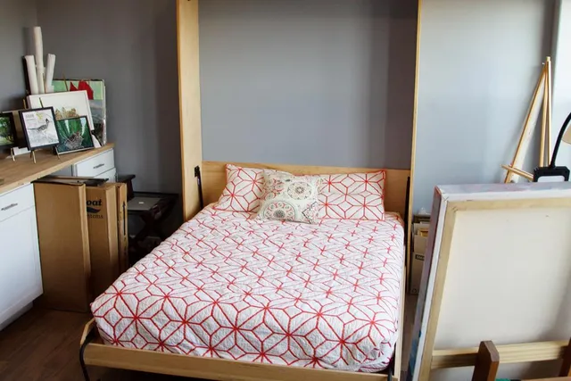 a bathroom with a sink a mirror and a toilet