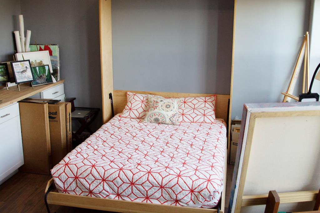 199 Hermosa Road Southwest Hunt, TX 78024 - Photo 35 of 59 a bedroom with a bed and wooden floor