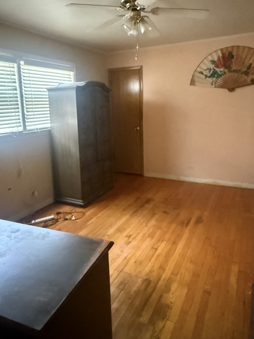 10553 South Calumet Avenue Chicago, IL 60628 - Photo 16 of 21 a view of empty room with fan